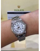ROLEX DATEJUST 31 REF 68240 WHITE ROMAN NUMBERALS DIAL WITH DIAMONDS BEZEL 31MM AUTOMATIC WATCH