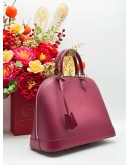 LOUIS VUITTON ALMA MM TOP HANDLE BAG IN MAROON EPI LEATHER   