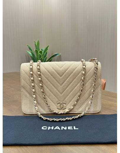 CHANEL STATEMENT FLAP BAG FEATURES IRIDESCENT BEIGE CAVIAR LEATHER CHEVRON QUILTING & LIGHT GOLD HARDWARE 